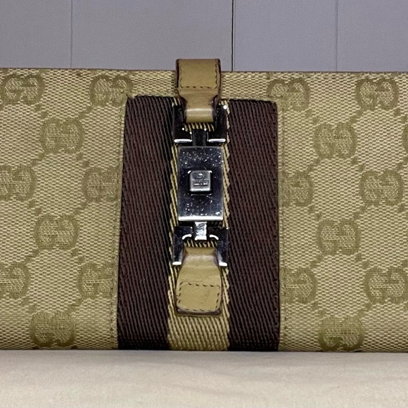 Gucci Handbags - Gucci Beige and Brown Clutch